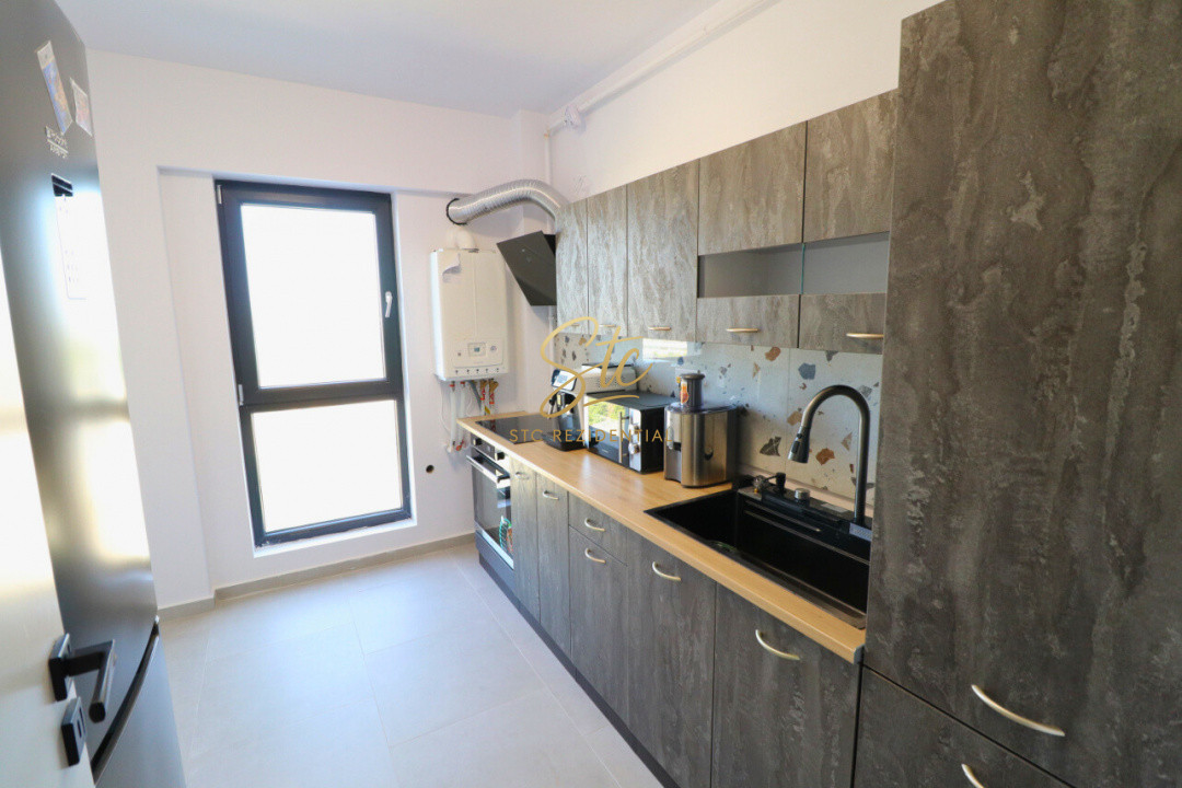 Bloc finalizat 2025 situat langa Auchan Titan - mobilat si utilat